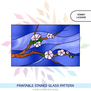 May include: Printable stained glass pattern featuring a branch with pink blossoms against a blue background. The pattern is for hobby use only.