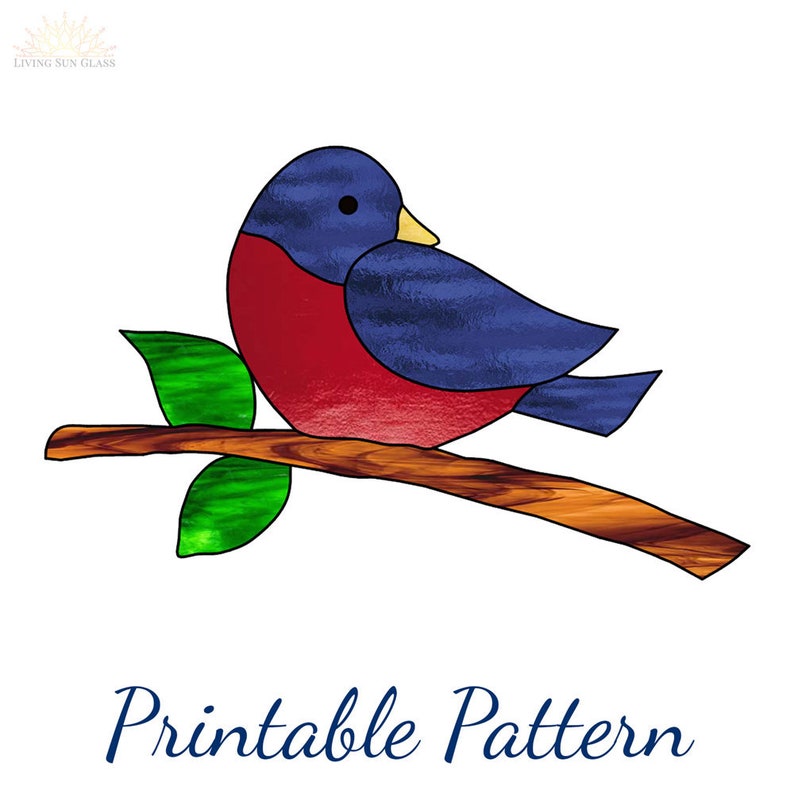 May include: Printable pattern for a stained glass bird with blue and red wings, perched on a brown branch with green leaves. The pattern is titled "Printable Pattern".