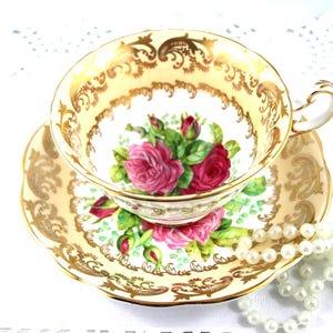 E.B Foley Beautiful Floral Duo, Colorful Rose Accent in the Center, Peach Gilded Borders, Bone English China made in 1960s