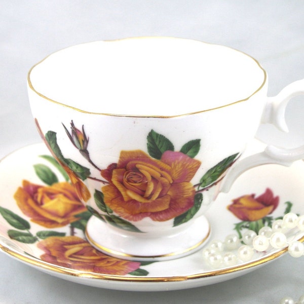 Queen Anne Lovely Duo, Large Roses on White Borders, Gold Rims, Bone English China made in 1960s