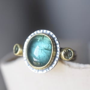 Indicolite tourmaline and green sapphire ring