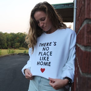 There’s No Place Like Home Wizard of Oz White Crewneck Sweatshirt