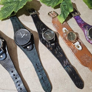 Watch with wide genuine leather strap