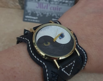 Montre CHAT , bracelet large cuir "celtique"