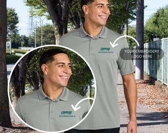 May include: A gray polo shirt with a small logo embroidered on the left chest. The logo is green, blue, and white and says "PRIME" with the words "Resource Management Systems, Inc." underneath. The text "YOUR EMBROIDERY LOGO HERE" is written above the logo.
