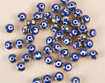 Cuentas espaciadoras de esmalte con forma de ojo turco, azul oscuro y dorado (6 mm)