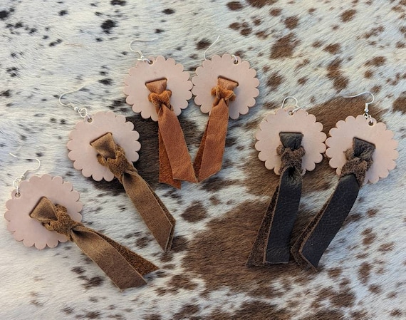 Slotted rosette concho tassel leather earrings