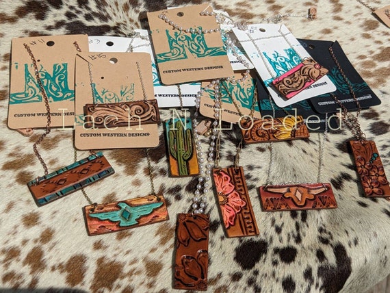 Tooled leather and chain necklaces