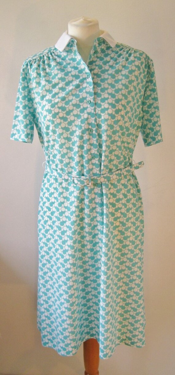 white and sea green dress