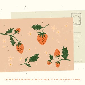 May include: A pink postcard with a hand-drawn illustration of a strawberry plant with red strawberries and white flowers. The postcard has a white border and the text "Sketching Essentials Brush Pack // The Gladdest Thing" at the bottom.