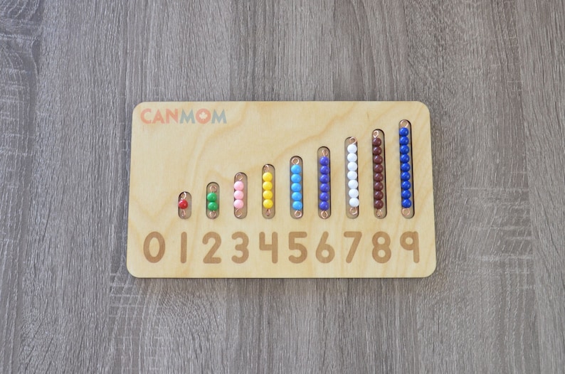 May include: Wooden counting board with colorful beads representing numbers 0 through 9. The beads are red, green, pink, yellow, blue, purple, white, brown, and blue.