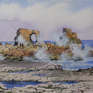 May include: Watercolour painting of a rugged coastline with breaking waves. The artwork shows a natural arch in the rock formation, with two figures standing nearby. The sky is a blend of blue and white, and birds are flying above.