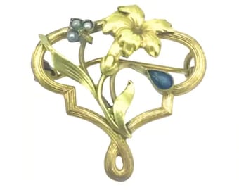 Broche Art Nouveau con piedra de pasta azul iris bañada en oro de 18 quilates