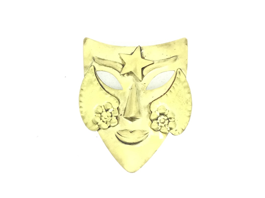 Grande broche de théâtre en cabochons de verre bleu