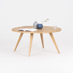 Round coffee table made of solid oak wood, scandinavian design