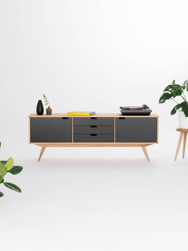 The Mid-Century Sideboard's spherical edges as well as its design celebrate and bow to the timeless style of 1950s and '60s. 