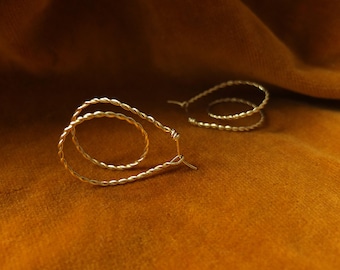 Hoop earrings made from a twisted gold plated thread