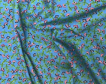 Scattered flowers on a blue background, cotton vintage print, 100% cotton available from 0.5 m