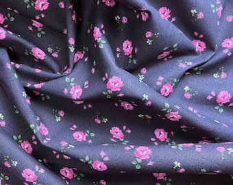 Cotton fabric in midnight blue with pink flowers 100% cotton available from 0.5 m SWAFING