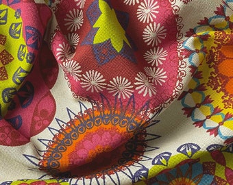 Decorative fabric colorfully patterned with mandalas in bright colors available from 0.5 m