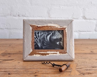 4 x 6 Upcycled Photo Frame by Luna Designs made from reclaimed vintage skirting board. Weathered grey with white and cream undercoats.