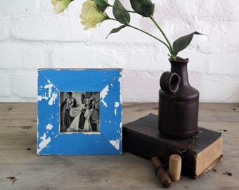 A 4x4 recycled timber photo frame by Luna Designs. Made from an authentic reclaimed timber. A unique piece.