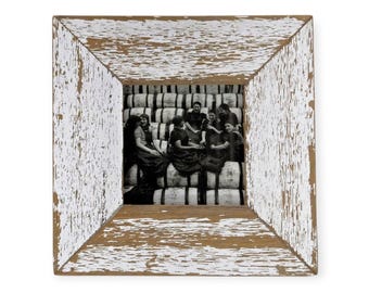 A 4x4 upcycled timber photo frame by Luna Designs. Made from an authentic reclaimed architectural salvage. A unique item.