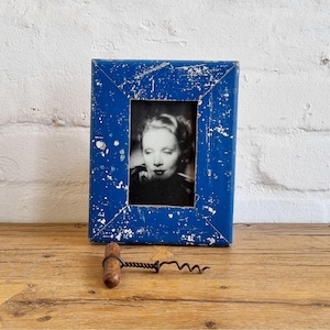 A 4x6 recycled timber photo frame by Luna Designs. Made from an authentic 60&#39;s skirting board in royal blue. A unique piece.