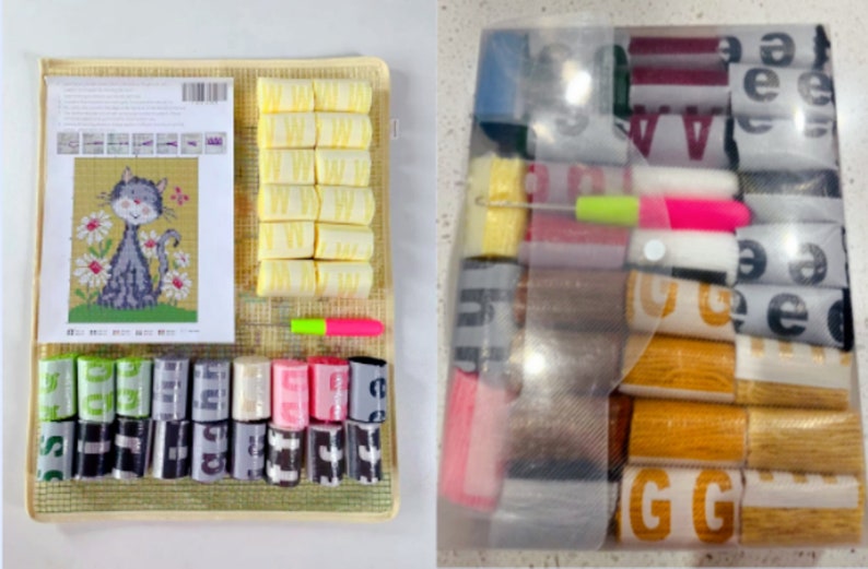 Op de afbeelding: Een naaldvilten set met een kat met bloemen. De set bevat een canvas, garen, naalden en instructies. Het garen is georganiseerd in kleine plastic containers met letters en nummers.