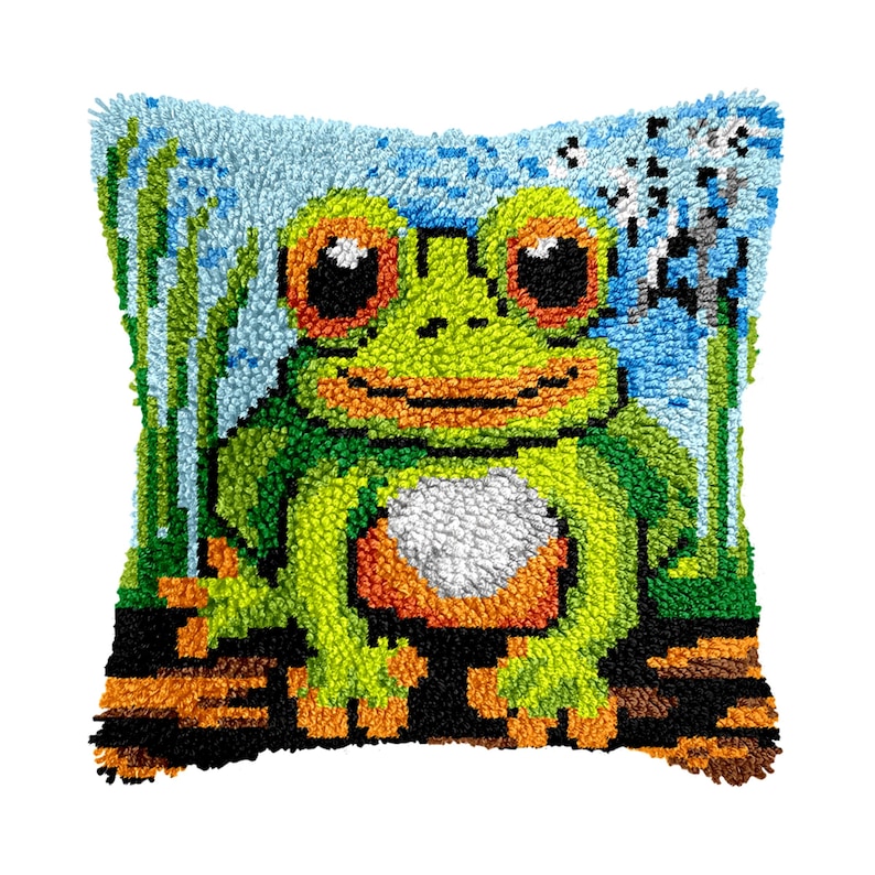 May include: A green frog with orange spots and large eyes is sitting on a brown log. The frog is surrounded by green grass and blue water. The frog is smiling and has a white belly. The background is a blue sky with white clouds.