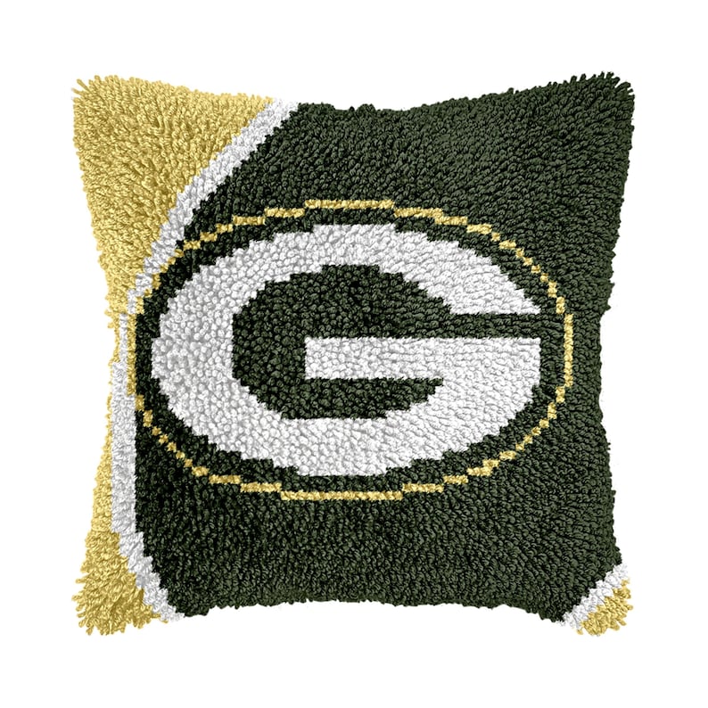 May include: Green and gold plush pillow with a white "G" in the center. The pillow is made of a soft, fuzzy material and is perfect for adding a touch of team spirit to your home decor.
