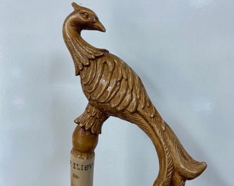 Hand carved wooden walking stick by dogwood tree with phoenix grip. One of a kind collectible walking stick.