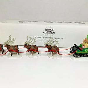 Dept 56 North Pole Sleigh and Eight Tiny Reindeer Figurine