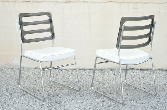Smoked lucite chairs deals