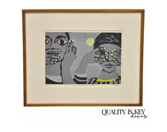 May include: A framed print of a colorful abstract art piece depicting two figures with their hands covering their eyes and mouth. The title of the artwork is "See not, speak not,  " and the artist's signature is visible in the bottom right corner.