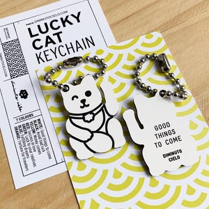 Luckycat keyring manekineko keychain fortune cat japanese gift pet lover. Colour: white