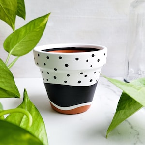 Black and white polka dot hand painted terra cotta pot, indoor planter pot with drainage hole. image 1