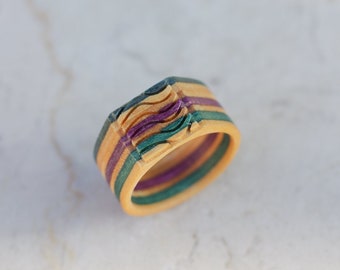 7PLIS recycled skateboard ring, red green black blue wood, handmade