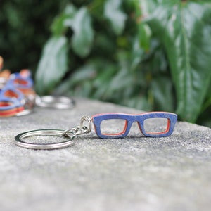 Recycled 7PLIS keyring from used skateboard - blue red and Wood