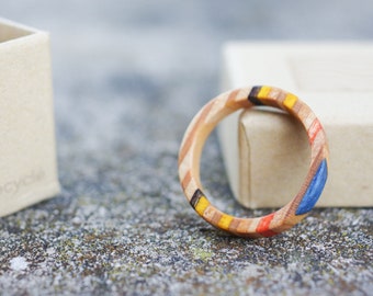 skateboard recycled wood ring yellow blue