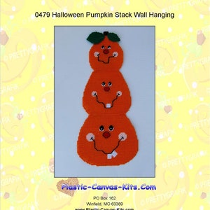 May include: A plastic canvas pattern for a wall hanging featuring a stack of three orange pumpkins with smiling faces. The pattern is titled "0479 Halloween Pumpkin Stack Wall Hanging" and includes the website address "Plastic-Canvas-Kits.Com".