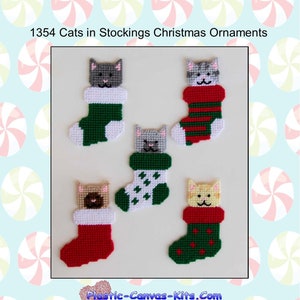 May include: A set of five plastic canvas kits featuring cats wearing Christmas stockings. The kits are for making ornaments and feature different coloured stockings and cats. The kits are from Plastic-Canvas-Kits.com.