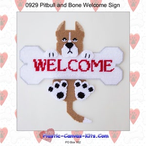 May include: A plastic canvas pattern for a welcome sign featuring a brown and white pitbull holding a bone with the word "WELCOME" in red letters.