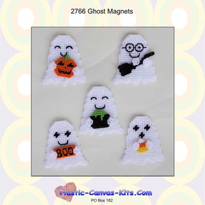 May include: Five white plastic canvas ghost magnets with different Halloween designs. The ghosts are holding a pumpkin, a broom, a cauldron, a candy corn, and a sign that says "BOO".