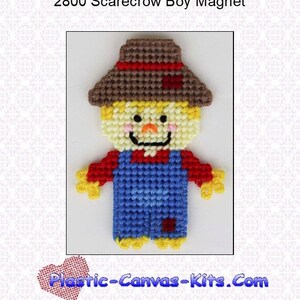May include: A plastic canvas pattern for a scarecrow boy magnet. The pattern is for a small, smiling scarecrow with a brown hat, red shirt, blue overalls, and yellow shoes. The pattern is available on Plastic-Canvas-Kits.com.
