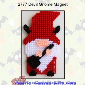 May include: A red and white plastic canvas pattern of a devil gnome holding a pitchfork. The pattern is for a magnet and is labeled "2777 Devil Gnome Magnet".