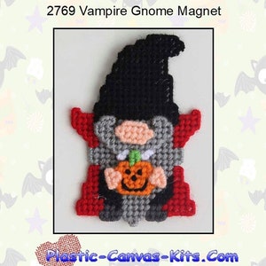 May include: A plastic canvas pattern for a vampire gnome holding a pumpkin. The pattern is red, black, gray, and orange. The pattern is titled "2769 Vampire Gnome Magnet" and the website "Plastic-Canvas-Kits.Com" is displayed below the pattern.