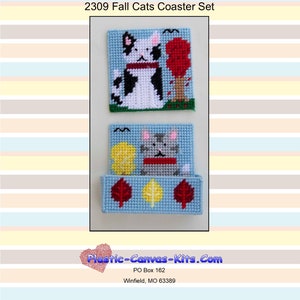 May include: A set of two plastic canvas coasters featuring a black and white cat with a red tree and a gray cat with yellow and red leaves. The coasters are on a blue background with white stripes. The text "2309 Fall Cats Coaster Set" is at the top of the image.