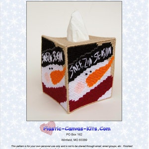 May include: A handmade tissue box cover featuring a snowman design. The box is made of plastic canvas and has a black, white, orange, and burgundy color scheme. The text "Sneeze Season" is displayed on the sides. The tissue box topper is a seasonal craft item.