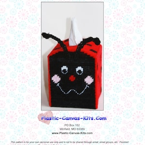 May include: A red and black ladybug tissue box cover with a white tissue peeking out. The cover is made of plastic canvas and is a craft project. The image includes the text "Plastic-Canvas-Kits.Com", "PO Box 162", "Winfield, MO 63389", and "www.Plastic-Canvas-Kits.com".